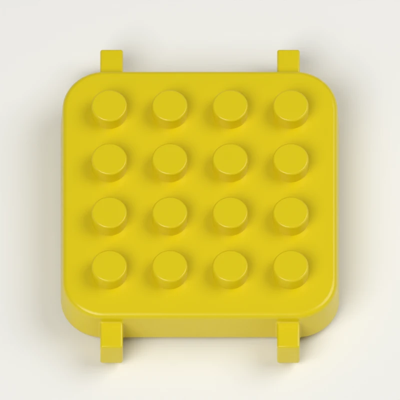 Playtime stud-plate component study illustrating modular product design.