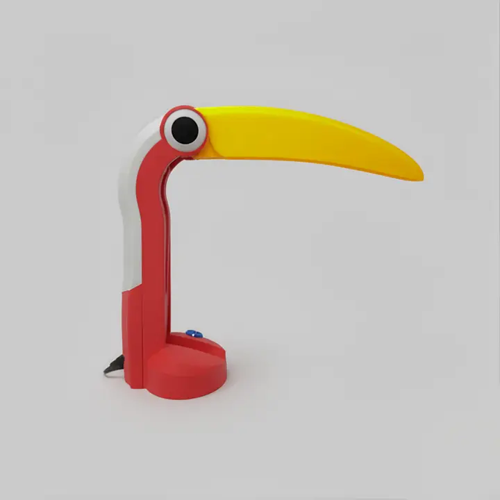 Red and yellow Toucan Lamp shown in a product presentation image.
